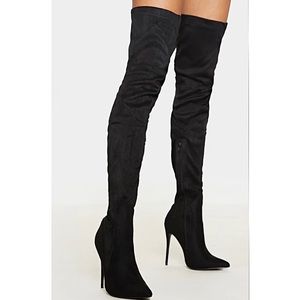 Black thigh high boots